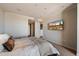 Bedroom with modern style and decor, featuring muted gray tones, and soft carpet at 7181 E Camelback Rd # 702, Scottsdale, AZ 85251
