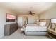 Spacious main bedroom featuring plush carpet and a neutral color palette at 7181 E Camelback Rd # 702, Scottsdale, AZ 85251