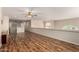 Upstairs loft area with wood floors and decorative arched windows at 7247 W Buckskin Trl, Peoria, AZ 85383
