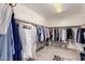 Spacious walk-in closet with ample storage and organizational systems for clothes and accessories at 7247 W Buckskin Trl, Peoria, AZ 85383