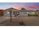 Charming single-story home featuring a low-maintenance front yard and a quaint, covered entrance at 7440 E Hubbell St, Scottsdale, AZ 85257