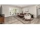 Cozy living room with a stylish rug, comfortable seating, and natural light at 7440 E Hubbell St, Scottsdale, AZ 85257