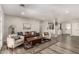 Bright living room with a decorative rug, comfortable seating, and views into the kitchen at 7440 E Hubbell St, Scottsdale, AZ 85257