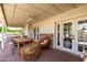 Outdoor patio featuring an outdoor dining table and wicker patio furniture at 7440 E Hubbell St, Scottsdale, AZ 85257