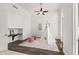 Bonus room boasts lots of space and neutral colors, perfect for a play area at 7775 E Fledgling Dr, Scottsdale, AZ 85255