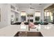 Modern Kitchen showcasing an island sink and views of the great room at 7775 E Fledgling Dr, Scottsdale, AZ 85255