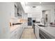 Modern kitchen showcasing an island with stainless steel appliances at 7775 E Fledgling Dr, Scottsdale, AZ 85255