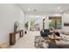 Spacious living room featuring a comfortable seating area and an open floor plan with tile flooring at 7775 E Fledgling Dr, Scottsdale, AZ 85255
