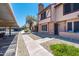 Exterior view of a condo with well-maintained landscaping and covered parking at 8111 W Wacker Rd # 94, Peoria, AZ 85381