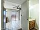 Bright kitchen and dining area with tile flooring and sliding glass door to the outside at 8111 W Wacker Rd # 94, Peoria, AZ 85381