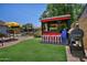 Outdoor bar and seating area create a perfect spot for relaxation and entertainment in this backyard at 927 N Somerset Cir, Mesa, AZ 85205