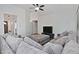 Spacious living room featuring a comfortable sectional sofa, recessed lighting, and tile floors at 927 N Somerset Cir, Mesa, AZ 85205