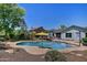Sparkling pool offers a refreshing escape and enhances the appeal of this beautiful backyard at 927 N Somerset Cir, Mesa, AZ 85205