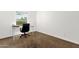 Spare bedroom with neutral carpet, a desk for home office use, and a window with a peaceful view at 9322 E Jenan Dr, Scottsdale, AZ 85260