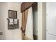 Close up on bathroom stall, highlighting tiled walls and brown cloth accents at 1004 E Gemini Dr, Tempe, AZ 85283