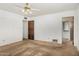 Simple bedroom with carpet flooring, showing the closet and the room's doorway at 1004 E Gemini Dr, Tempe, AZ 85283