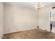 Formal dining room featuring a chandelier and bright natural light at 1004 E Gemini Dr, Tempe, AZ 85283