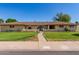 Front exterior of home with grass and walkway at 1004 E Gemini Dr, Tempe, AZ 85283
