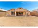 Backyard with a covered patio and space for outdoor activities at 10934 W Almeria Rd, Avondale, AZ 85392