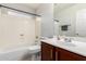 Full bathroom features a single sink, vanity and a shower and tub combination at 10934 W Almeria Rd, Avondale, AZ 85392