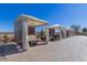 Outdoor cabanas with comfortable seating and privacy screens in a community area at 1166 W Silver Creek Ln, Queen Creek, AZ 85140