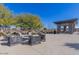 Inviting outdoor fire pit area with comfortable seating, perfect for entertaining and enjoying cool evenings at 1166 W Silver Creek Ln, Queen Creek, AZ 85140
