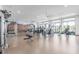 Well-equipped gym with a variety of machines and natural light, promoting an active lifestyle at 1166 W Silver Creek Ln, Queen Creek, AZ 85140