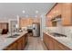 Beautiful kitchen featuring a center island, stainless appliances, and plenty of cabinet space at 1166 W Silver Creek Ln, Queen Creek, AZ 85140