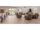 Cozy living room featuring a large sliding door to the outdoor patio and an open layout at 1166 W Silver Creek Ln, Queen Creek, AZ 85140