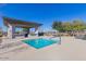 A community spa with a covered area, grill and a table with seating at 1166 W Silver Creek Ln, Queen Creek, AZ 85140