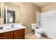 A bathroom featuring tile floors, a full bathtub, and a wood vanity at 1250 S Rialto -- # 78, Mesa, AZ 85209