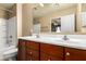This bathroom has double sinks and a shower-tub combo, maximizing comfort and convenience at 1250 S Rialto -- # 78, Mesa, AZ 85209