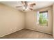 This bedroom provides a serene view with a window and desert scenery, perfect for relaxation at 1250 S Rialto -- # 78, Mesa, AZ 85209