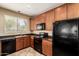 This kitchen features stainless steel appliances, granite countertops, and wooden cabinetry for a modern feel at 1250 S Rialto -- # 78, Mesa, AZ 85209