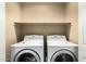 This laundry room includes a set of white washer and dryer units at 1250 S Rialto -- # 78, Mesa, AZ 85209