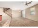 Bright living space with ceiling fan and open staircase, perfect for modern living at 1250 S Rialto -- # 78, Mesa, AZ 85209