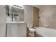 Inviting bathroom featuring a shower and tub combo, a vanity, updated fixtures and tile accents at 14002 N 38Th St, Phoenix, AZ 85032