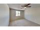 Bright bedroom with carpeted floors and natural light from a large window at 14002 N 38Th St, Phoenix, AZ 85032