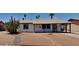 Charming single-story home featuring desert landscaping, covered entry, and a connected carport at 14002 N 38Th St, Phoenix, AZ 85032
