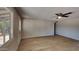 Comfortable living room area featuring vinyl flooring, ceiling fan and access to backyard at 14002 N 38Th St, Phoenix, AZ 85032