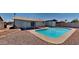 Enjoy the refreshing pool in this backyard oasis, perfect for relaxation and entertaining with an adjacent covered patio at 14002 N 38Th St, Phoenix, AZ 85032