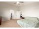 Large bedroom with walk-in closet and private ensuite bathroom at 14099 W Riviera Dr, Surprise, AZ 85379