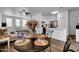 Modern dining area adjacent to kitchen, featuring stylish table set and stainless steel appliances at 1420 E Sonrisas St, Phoenix, AZ 85040