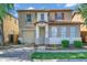 Charming two-story home featuring a neutral color scheme, attached garage, and well-maintained landscaping at 1420 E Sonrisas St, Phoenix, AZ 85040