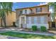Charming two-story home featuring a neutral color scheme, attached garage, and well-maintained landscaping at 1420 E Sonrisas St, Phoenix, AZ 85040