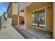 Outdoor patio area with sliding glass door access and a view of the backyard at 1420 E Sonrisas St, Phoenix, AZ 85040