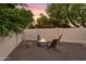 Outdoor firepit area featuring cozy seating and desert landscaping at 14401 N 60Th Pl, Scottsdale, AZ 85254