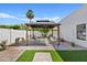 Backyard gazebo with desert landscaping, outdoor seating, and a relaxing space at 14401 N 60Th Pl, Scottsdale, AZ 85254