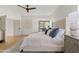 Charming primary bedroom boasts comfortable queen bed and neutral decor at 14401 N 60Th Pl, Scottsdale, AZ 85254