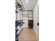 Functional walk-in closet featuring custom shelving and ample storage at 14401 N 60Th Pl, Scottsdale, AZ 85254